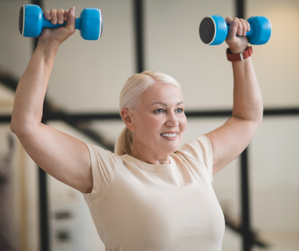 woman using small barbells for strength training